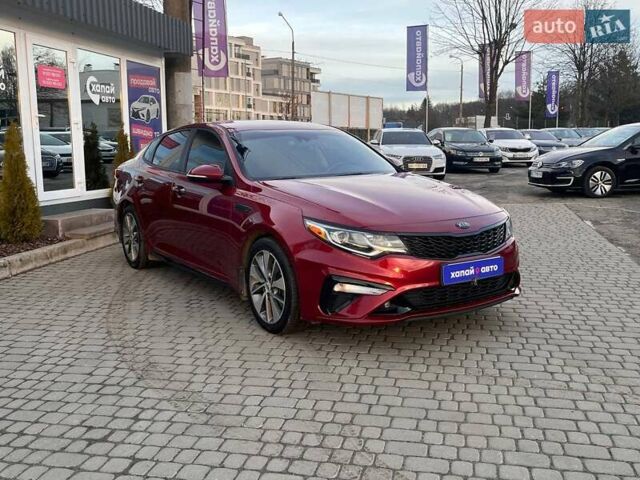 Красный Киа Оптима, объемом двигателя 2.36 л и пробегом 85 тыс. км за 12800 $, фото 2 на Automoto.ua