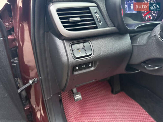 Красный Киа Оптима, объемом двигателя 2.4 л и пробегом 158 тыс. км за 12500 $, фото 26 на Automoto.ua