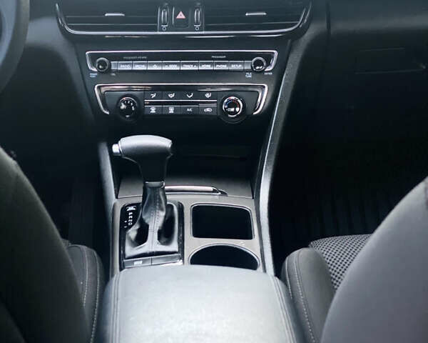 Красный Киа Оптима, объемом двигателя 2.36 л и пробегом 113 тыс. км за 14500 $, фото 2 на Automoto.ua