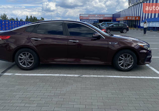 Красный Киа Оптима, объемом двигателя 2.36 л и пробегом 113 тыс. км за 14500 $, фото 49 на Automoto.ua