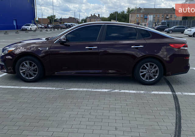 Красный Киа Оптима, объемом двигателя 2.36 л и пробегом 107 тыс. км за 13600 $, фото 46 на Automoto.ua