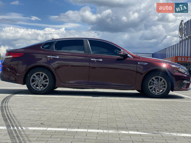 Красный Киа Оптима, объемом двигателя 2.36 л и пробегом 113 тыс. км за 14500 $, фото 27 на Automoto.ua