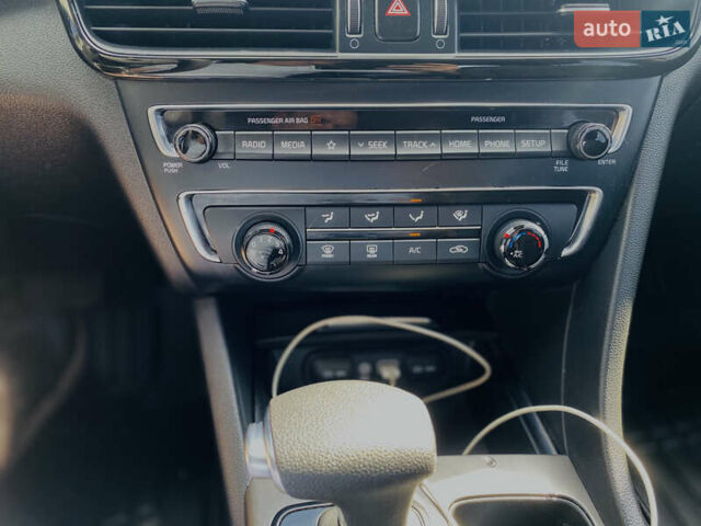 Красный Киа Оптима, объемом двигателя 2.36 л и пробегом 113 тыс. км за 14500 $, фото 13 на Automoto.ua