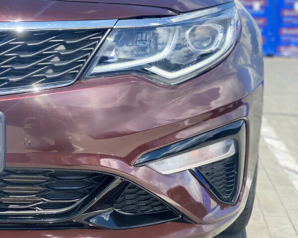 Красный Киа Оптима, объемом двигателя 2.36 л и пробегом 113 тыс. км за 14500 $, фото 23 на Automoto.ua