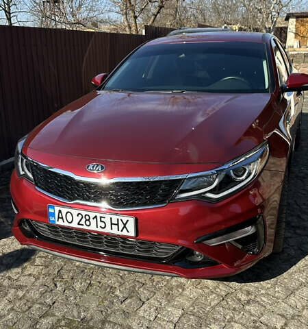 Красный Киа Оптима, объемом двигателя 2.36 л и пробегом 60 тыс. км за 15900 $, фото 2 на Automoto.ua