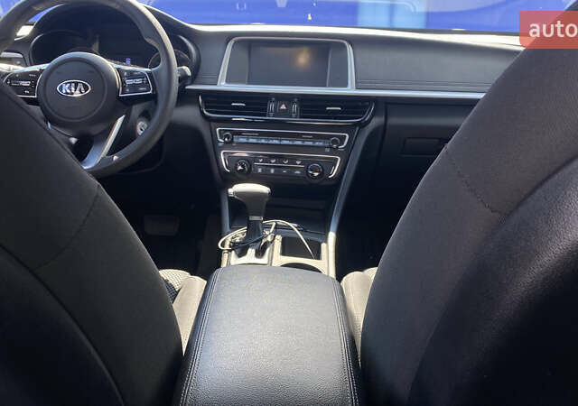 Красный Киа Оптима, объемом двигателя 2.36 л и пробегом 107 тыс. км за 13600 $, фото 40 на Automoto.ua