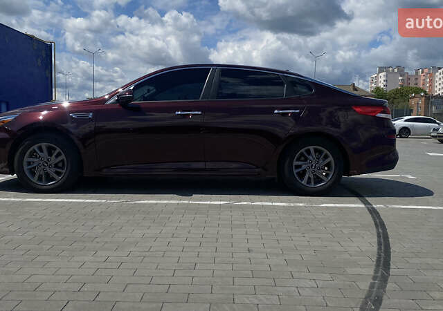 Красный Киа Оптима, объемом двигателя 2.36 л и пробегом 113 тыс. км за 14500 $, фото 31 на Automoto.ua