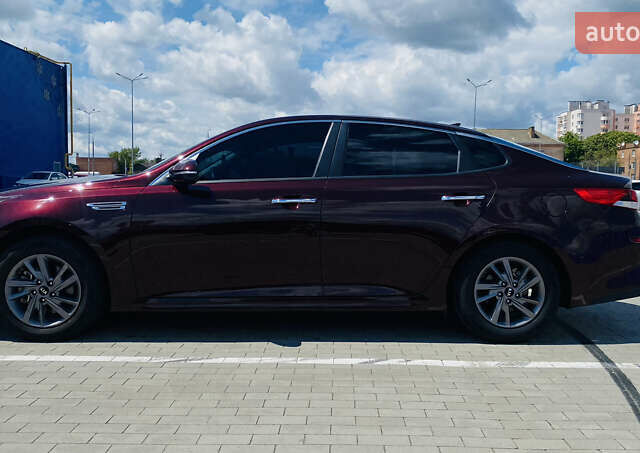 Красный Киа Оптима, объемом двигателя 2.36 л и пробегом 113 тыс. км за 14500 $, фото 32 на Automoto.ua