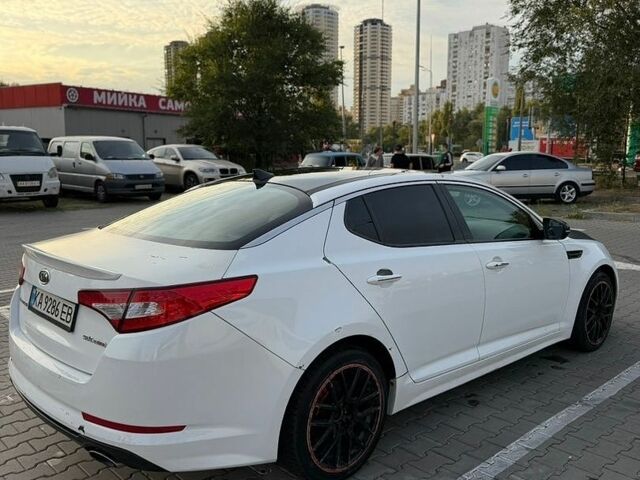Киа Оптима, объемом двигателя 2 л и пробегом 233 тыс. км за 6500 $, фото 7 на Automoto.ua