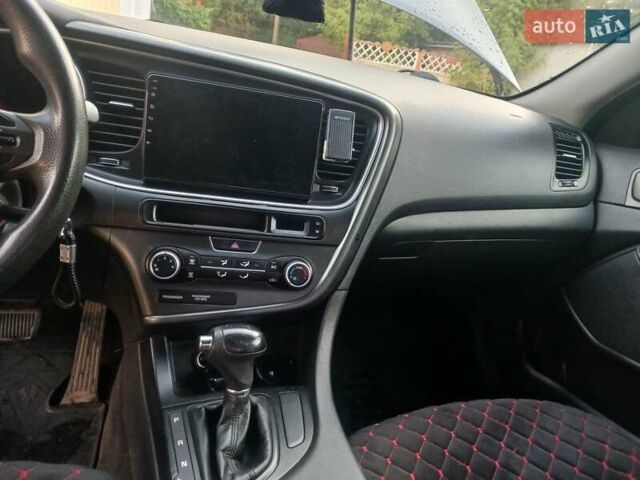 Киа Оптима, объемом двигателя 2.36 л и пробегом 240 тыс. км за 9500 $, фото 11 на Automoto.ua