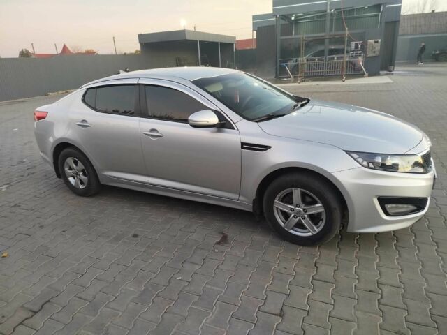 Серый Киа Оптима, объемом двигателя 2 л и пробегом 290 тыс. км за 9000 $, фото 1 на Automoto.ua