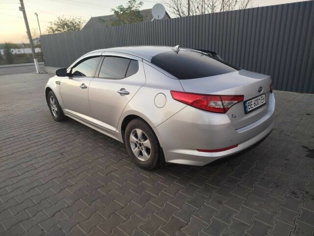 Серый Киа Оптима, объемом двигателя 2 л и пробегом 290 тыс. км за 9000 $, фото 4 на Automoto.ua