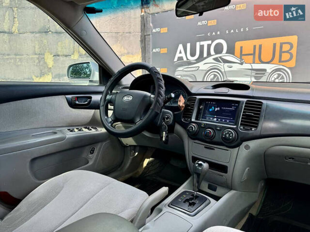 Серый Киа Оптима, объемом двигателя 2.66 л и пробегом 219 тыс. км за 4500 $, фото 9 на Automoto.ua