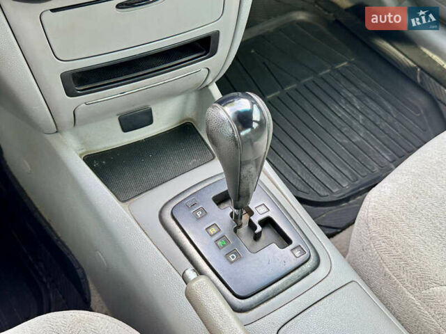 Серый Киа Оптима, объемом двигателя 2.66 л и пробегом 219 тыс. км за 4500 $, фото 13 на Automoto.ua