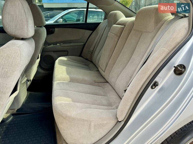 Серый Киа Оптима, объемом двигателя 2.66 л и пробегом 219 тыс. км за 4500 $, фото 7 на Automoto.ua