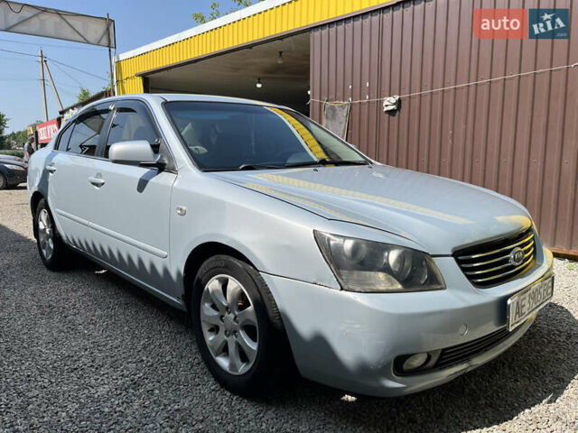 Серый Киа Оптима, объемом двигателя 2 л и пробегом 273 тыс. км за 4800 $, фото 5 на Automoto.ua