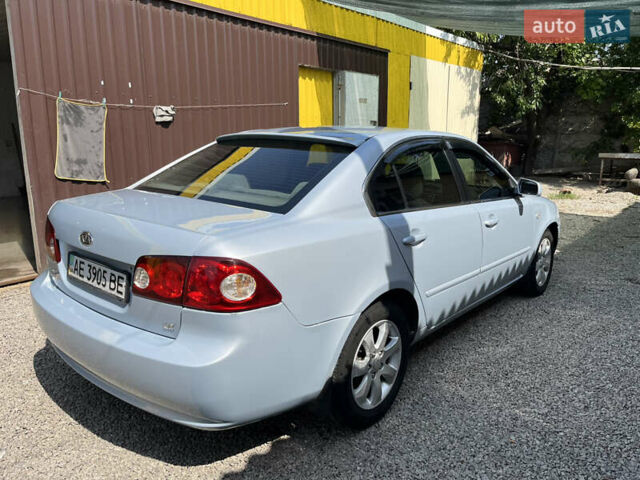 Серый Киа Оптима, объемом двигателя 2 л и пробегом 273 тыс. км за 4800 $, фото 4 на Automoto.ua