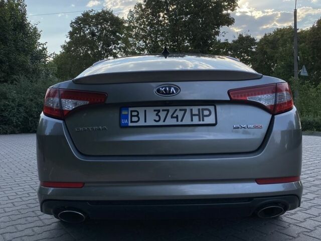 Сірий Кіа Оптіма, об'ємом двигуна 2 л та пробігом 165 тис. км за 10400 $, фото 6 на Automoto.ua