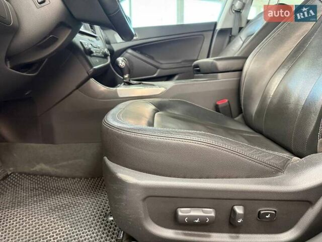 Серый Киа Оптима, объемом двигателя 2 л и пробегом 145 тыс. км за 10490 $, фото 13 на Automoto.ua