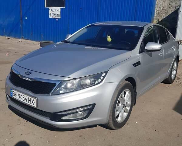 Серый Киа Оптима, объемом двигателя 2 л и пробегом 300 тыс. км за 9300 $, фото 4 на Automoto.ua