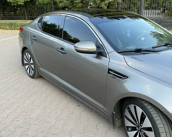 Серый Киа Оптима, объемом двигателя 2 л и пробегом 265 тыс. км за 10400 $, фото 8 на Automoto.ua
