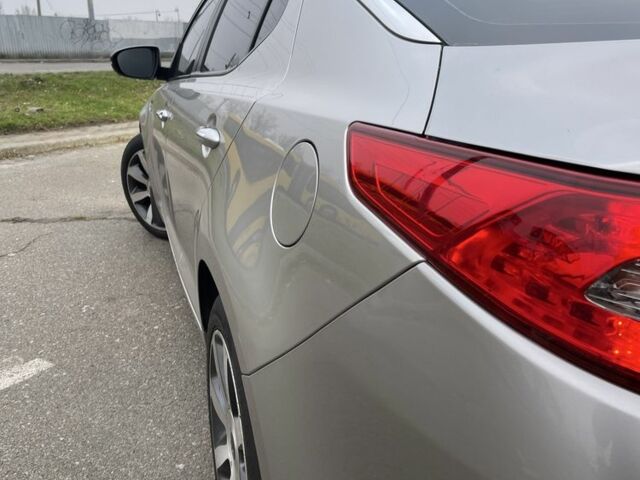 Серый Киа Оптима, объемом двигателя 2 л и пробегом 243 тыс. км за 10500 $, фото 23 на Automoto.ua