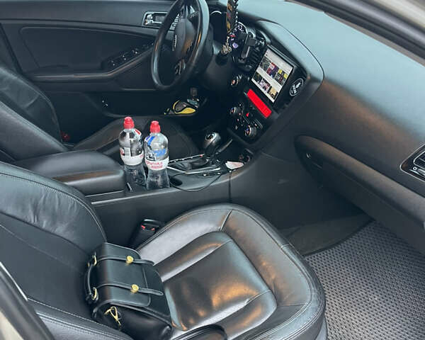 Серый Киа Оптима, объемом двигателя 2 л и пробегом 245 тыс. км за 10500 $, фото 21 на Automoto.ua