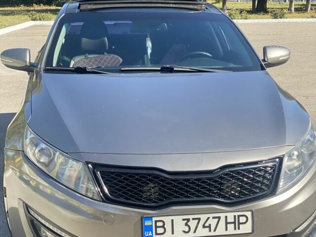 Сірий Кіа Оптіма, об'ємом двигуна 2 л та пробігом 165 тис. км за 10400 $, фото 1 на Automoto.ua