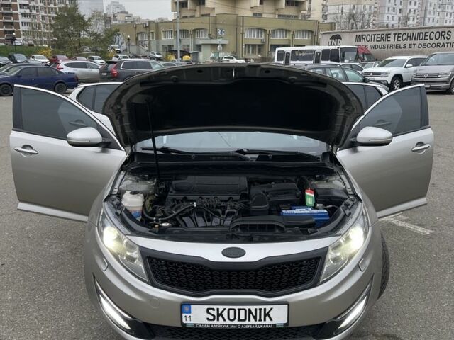 Серый Киа Оптима, объемом двигателя 2 л и пробегом 243 тыс. км за 10500 $, фото 11 на Automoto.ua