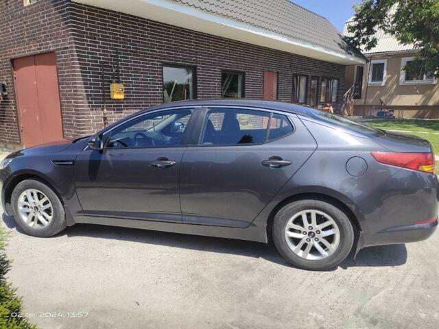 Серый Киа Оптима, объемом двигателя 2 л и пробегом 150 тыс. км за 10000 $, фото 2 на Automoto.ua