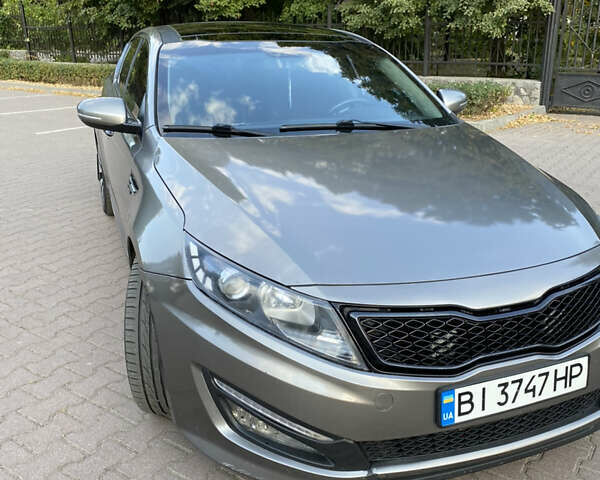 Серый Киа Оптима, объемом двигателя 2 л и пробегом 265 тыс. км за 10400 $, фото 9 на Automoto.ua