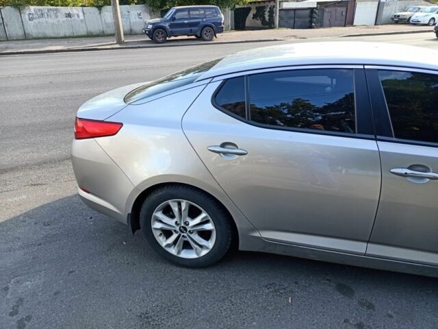 Серый Киа Оптима, объемом двигателя 2 л и пробегом 220 тыс. км за 8599 $, фото 2 на Automoto.ua