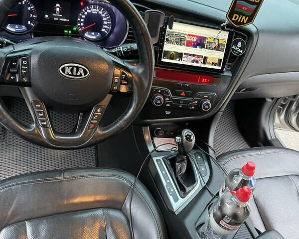 Серый Киа Оптима, объемом двигателя 2 л и пробегом 245 тыс. км за 10500 $, фото 11 на Automoto.ua