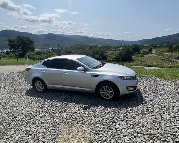 Серый Киа Оптима, объемом двигателя 2 л и пробегом 195 тыс. км за 10700 $, фото 12 на Automoto.ua