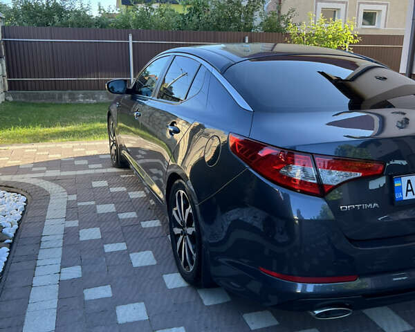 Серый Киа Оптима, объемом двигателя 2 л и пробегом 260 тыс. км за 8950 $, фото 18 на Automoto.ua
