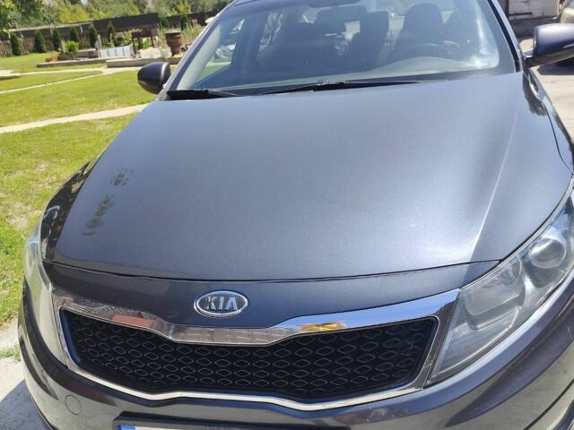 Серый Киа Оптима, объемом двигателя 2 л и пробегом 150 тыс. км за 10000 $, фото 3 на Automoto.ua