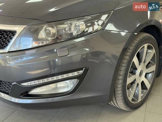 Серый Киа Оптима, объемом двигателя 2 л и пробегом 145 тыс. км за 10490 $, фото 4 на Automoto.ua