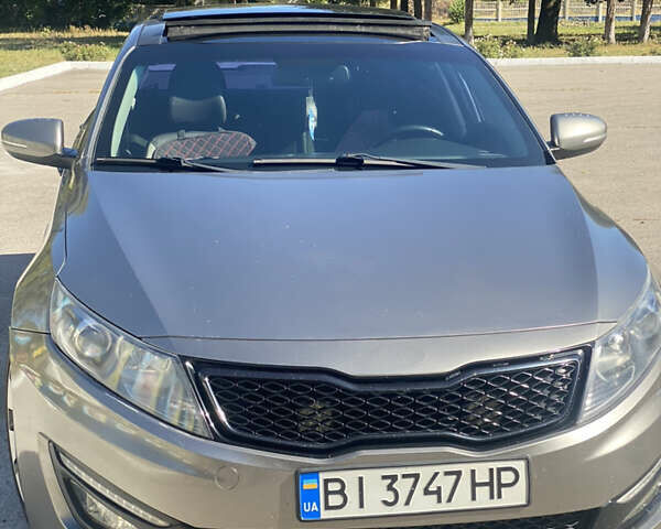 Серый Киа Оптима, объемом двигателя 2 л и пробегом 265 тыс. км за 10400 $, фото 1 на Automoto.ua