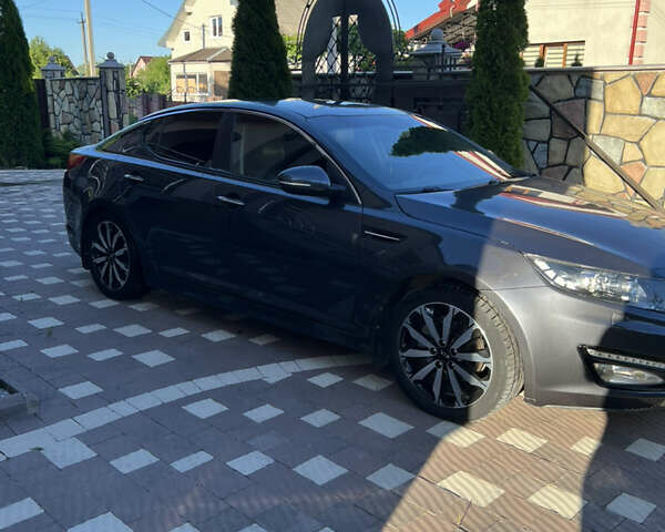 Серый Киа Оптима, объемом двигателя 2 л и пробегом 260 тыс. км за 8950 $, фото 14 на Automoto.ua