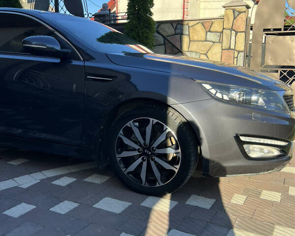 Серый Киа Оптима, объемом двигателя 2 л и пробегом 260 тыс. км за 8950 $, фото 9 на Automoto.ua