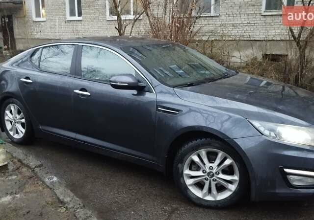 Сірий Кіа Оптіма, об'ємом двигуна 2 л та пробігом 205 тис. км за 10500 $, фото 5 на Automoto.ua