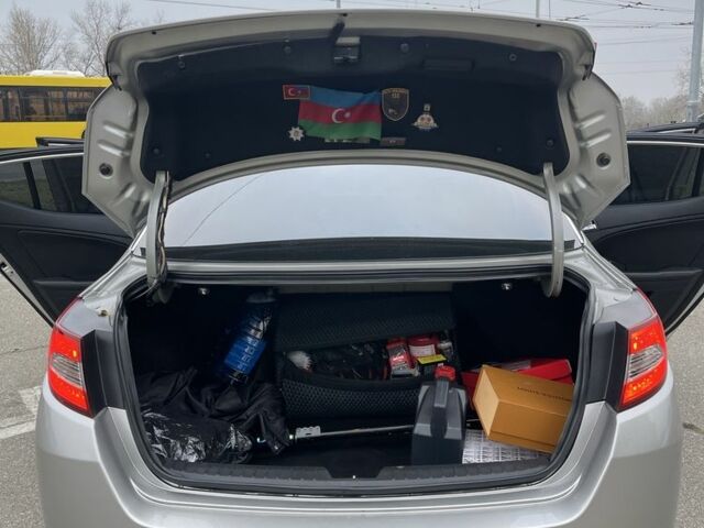 Серый Киа Оптима, объемом двигателя 2 л и пробегом 243 тыс. км за 10500 $, фото 14 на Automoto.ua