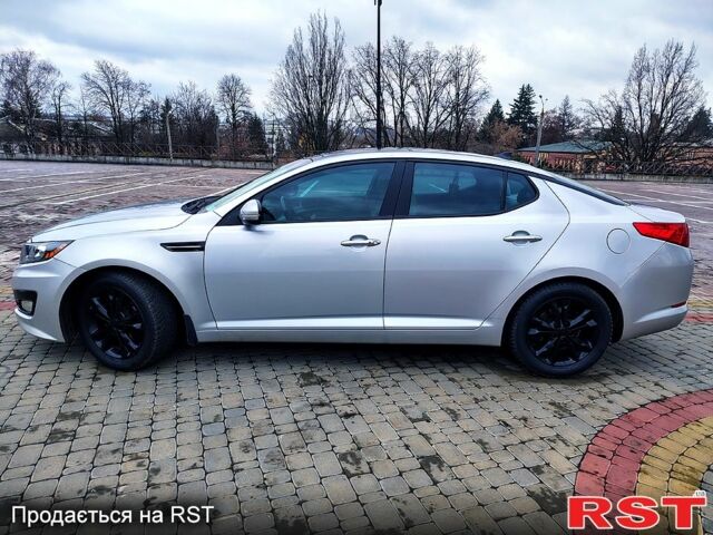 Серый Киа Оптима, объемом двигателя 2.4 л и пробегом 270 тыс. км за 8400 $, фото 5 на Automoto.ua