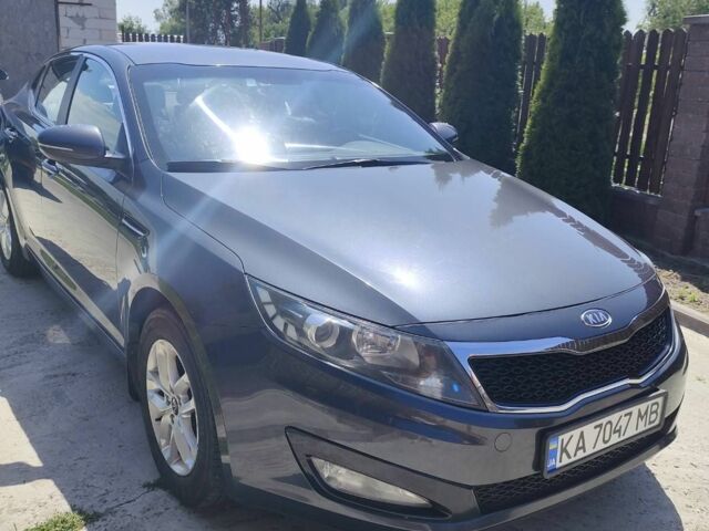 Серый Киа Оптима, объемом двигателя 2 л и пробегом 150 тыс. км за 10000 $, фото 1 на Automoto.ua