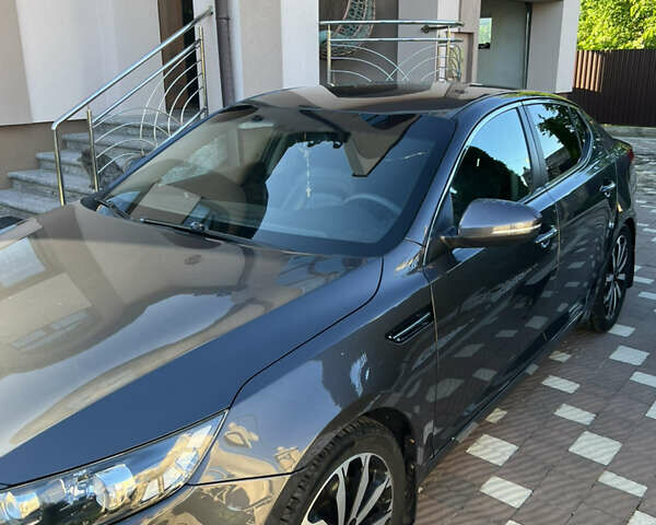 Серый Киа Оптима, объемом двигателя 2 л и пробегом 260 тыс. км за 8950 $, фото 6 на Automoto.ua
