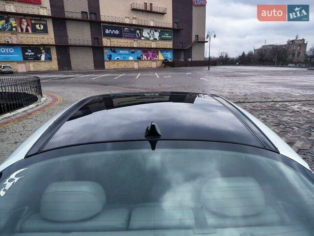 Серый Киа Оптима, объемом двигателя 2.4 л и пробегом 270 тыс. км за 8400 $, фото 12 на Automoto.ua