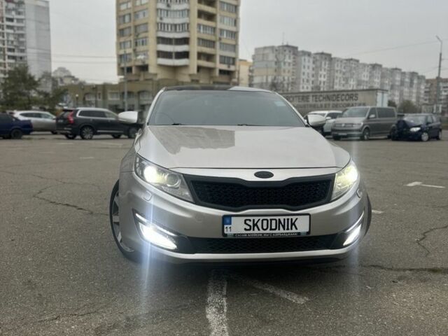 Серый Киа Оптима, объемом двигателя 2 л и пробегом 243 тыс. км за 10500 $, фото 1 на Automoto.ua