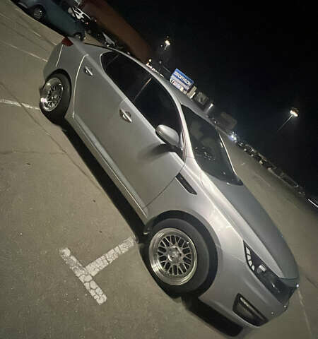 Серый Киа Оптима, объемом двигателя 2 л и пробегом 195 тыс. км за 10700 $, фото 17 на Automoto.ua