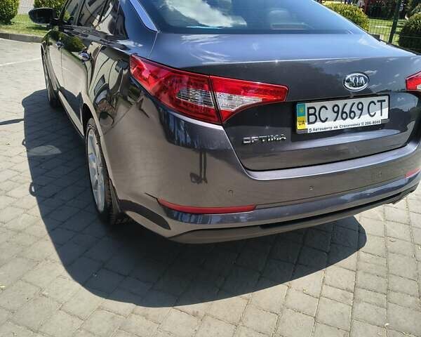 Сірий Кіа Оптіма, об'ємом двигуна 2 л та пробігом 175 тис. км за 9999 $, фото 25 на Automoto.ua