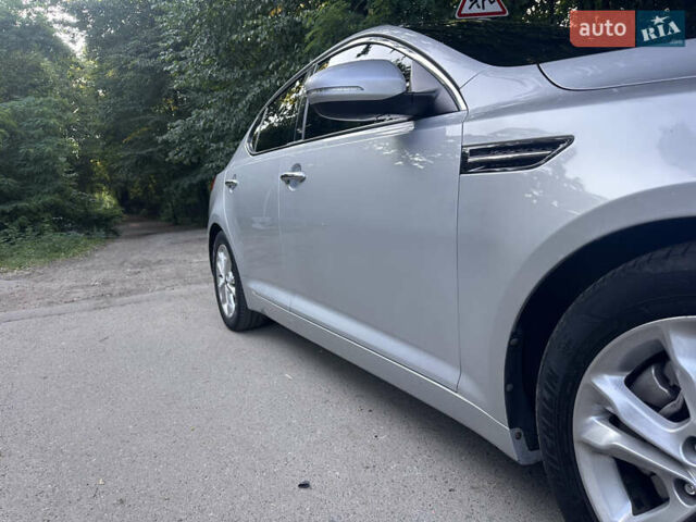 Серый Киа Оптима, объемом двигателя 2 л и пробегом 256 тыс. км за 10599 $, фото 7 на Automoto.ua